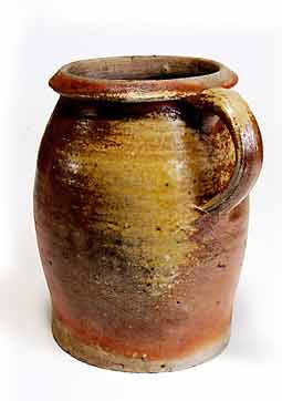 Old stoneware pot with handle