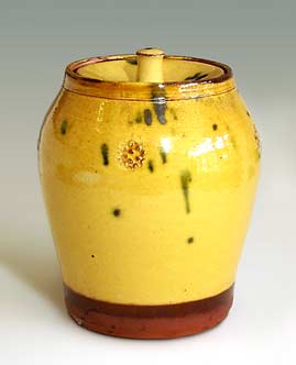Lidded slipware jar