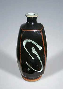 Beaten Swanson bottle vase